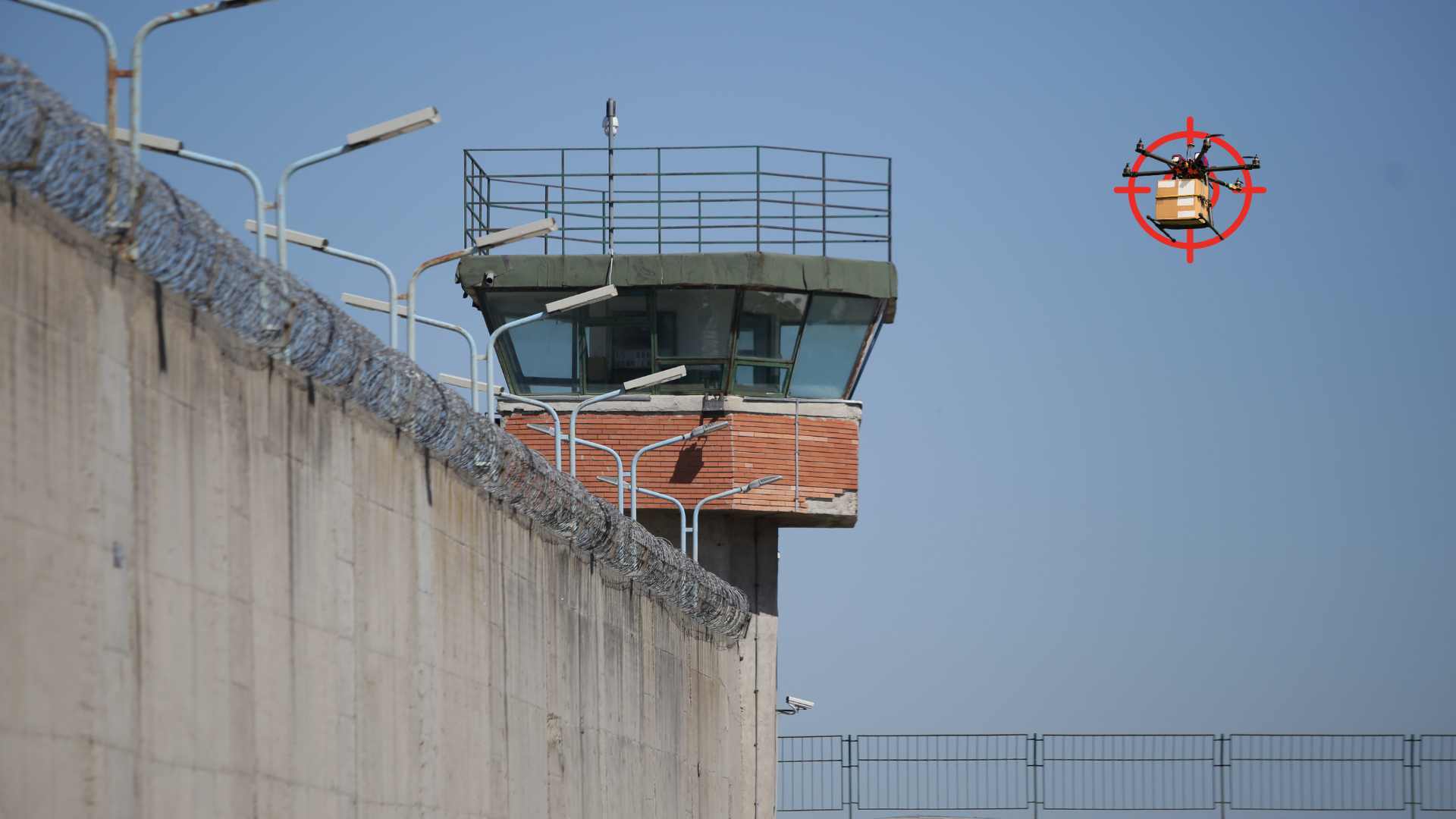 Drone with payload breaching prison wall